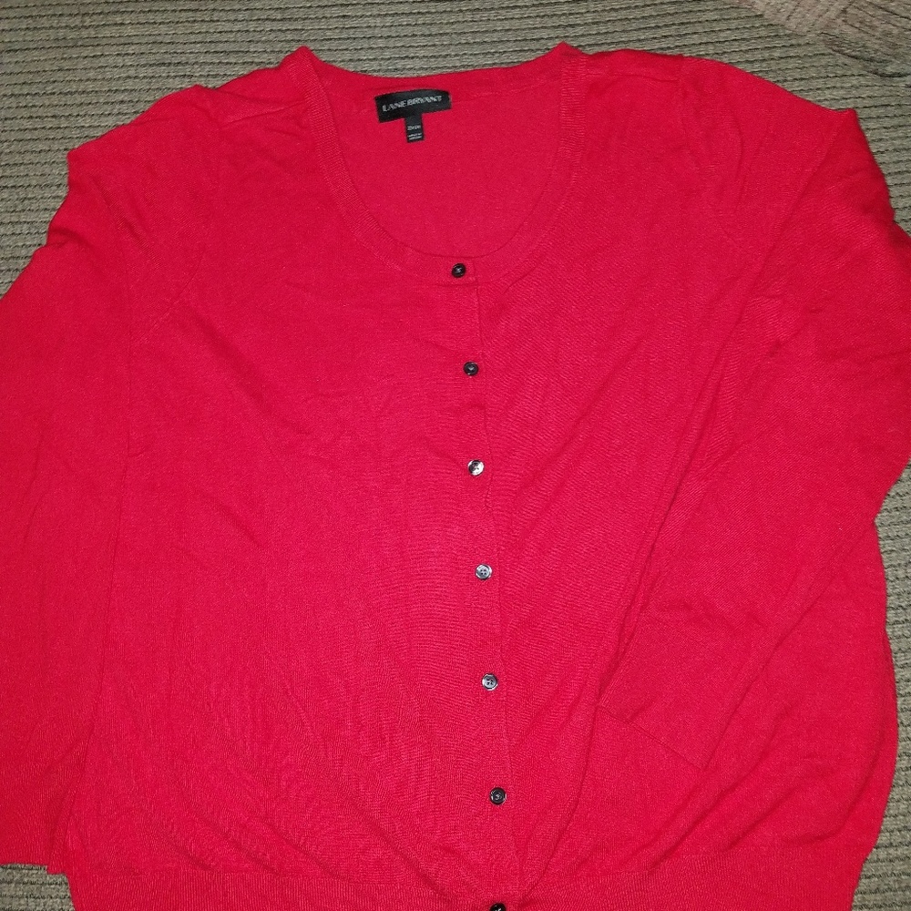 Lane Bryant cherry red sweater with black buttons.
